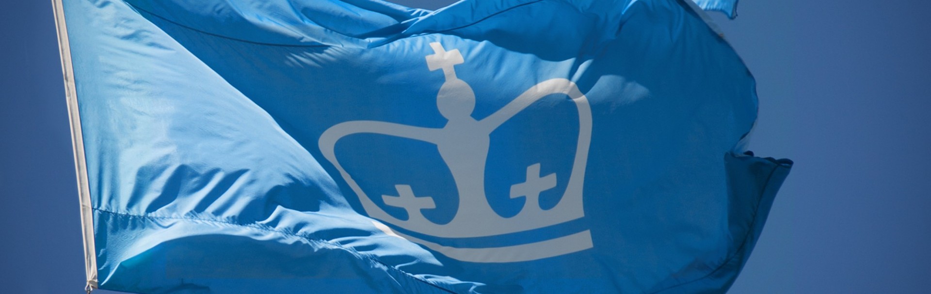 Columbia University flag waving in the wind